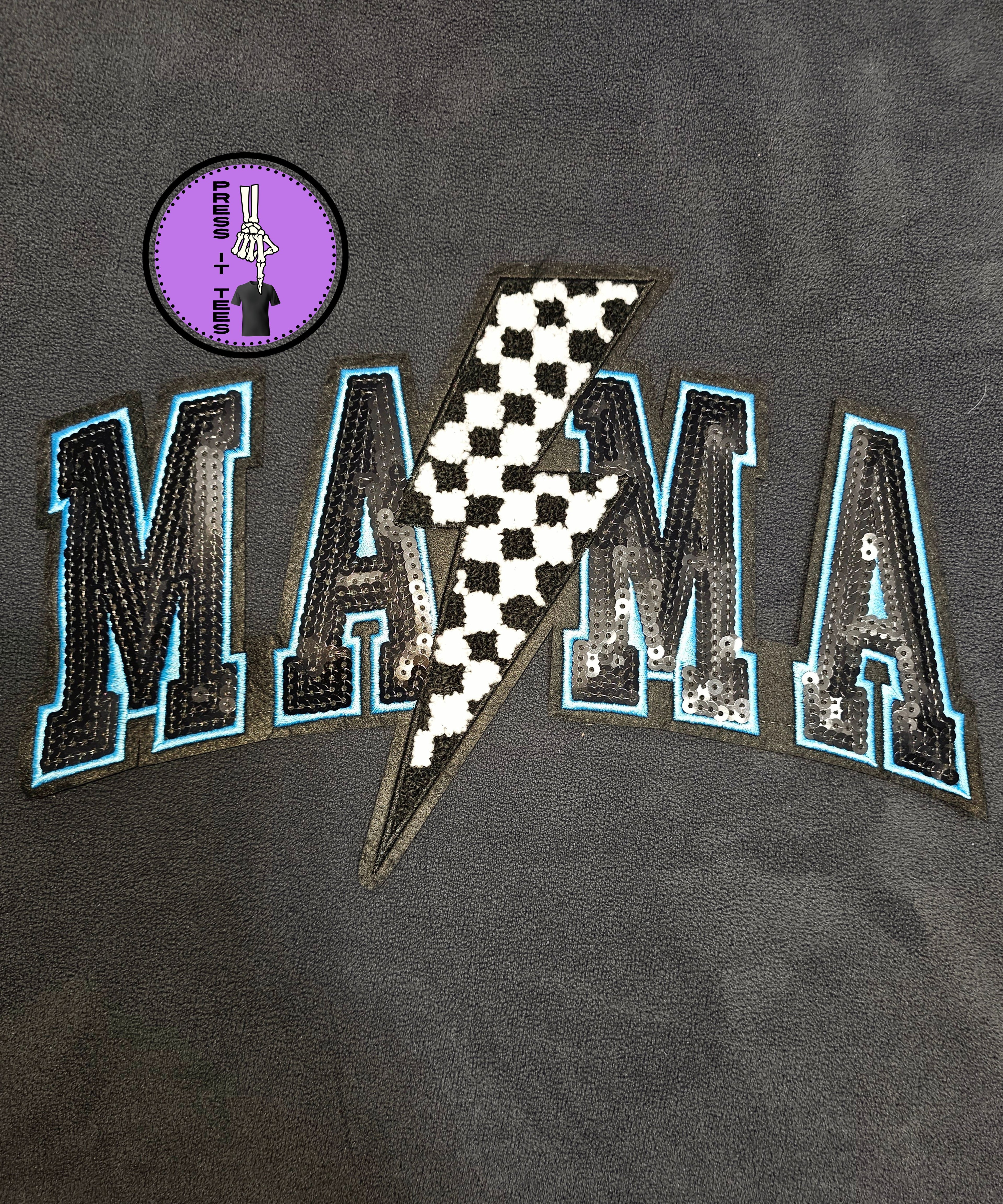 Press It Tees Mama Racing sequin patch on clothing, featuring shiny gold sequins and embroidered design details.