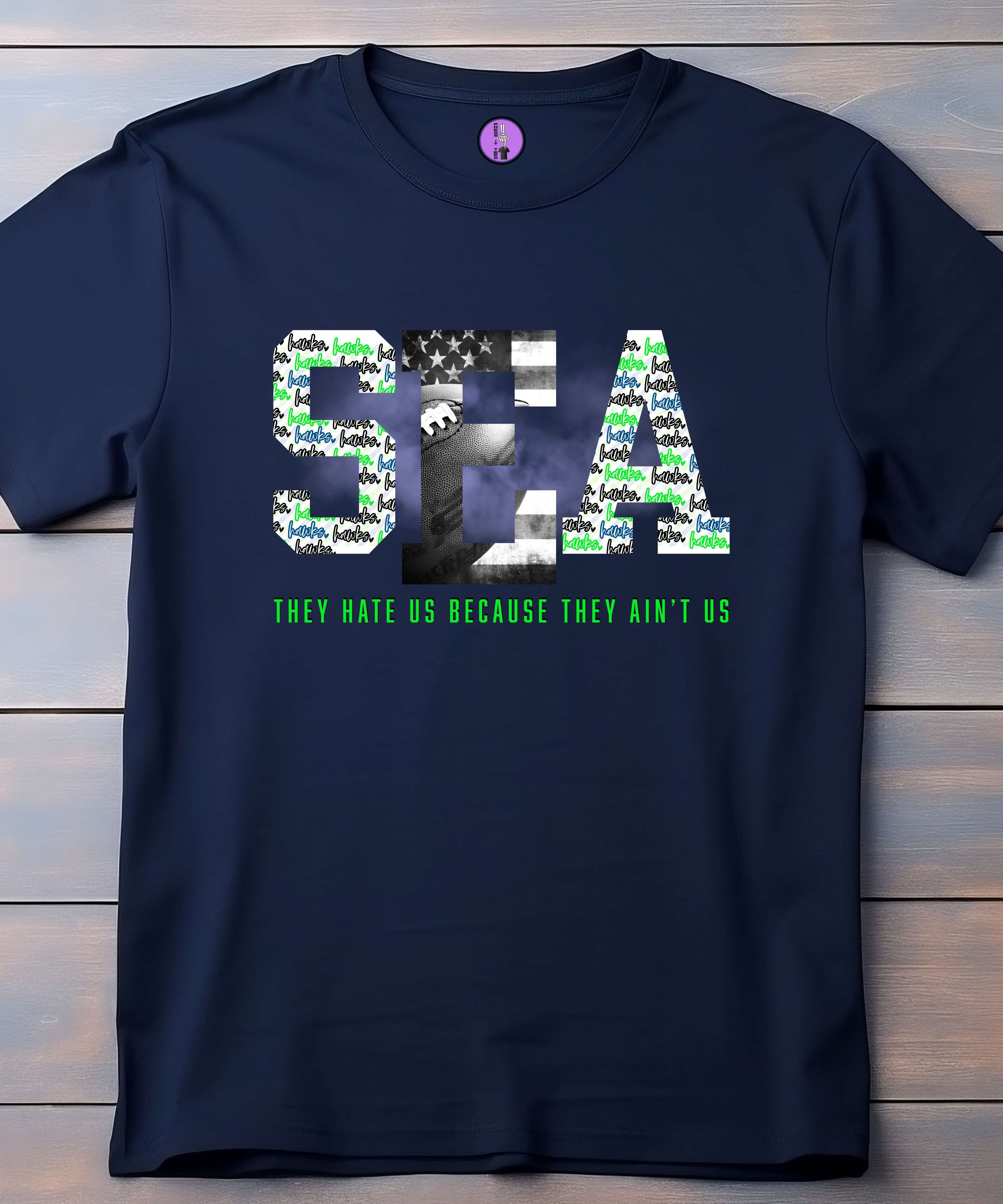Seattle Football Hate Us Aint Us short sleeve unisex T-shirt by Press It Tees, featuring bold text design on a casual clothing shirt.