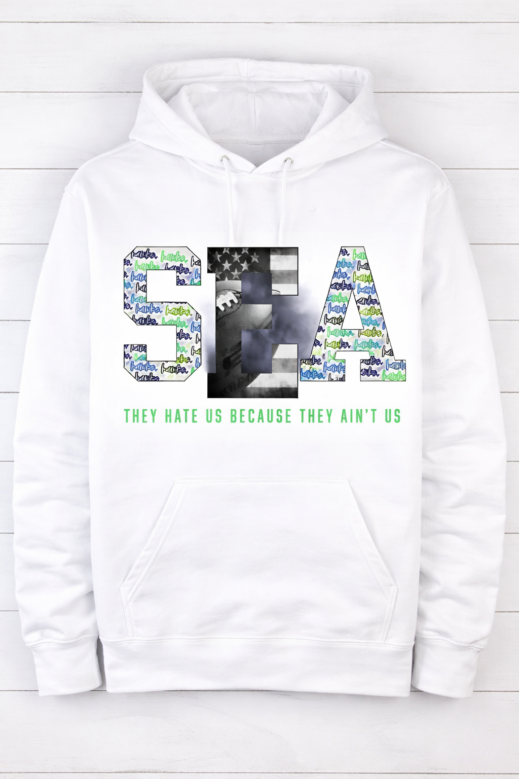 White unisex hoodie from Press It Tees featuring Seattle Hate Us They Ain't Us text, casual clothing with a bold graphic print.